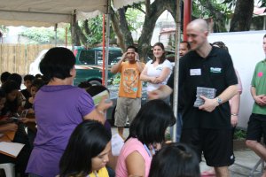 Philippines Mission Trip - Chris giving out CDs and resources to the churches (21 Sep 2009)